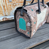 The Queen Tooled Leather Large Speedy Bag