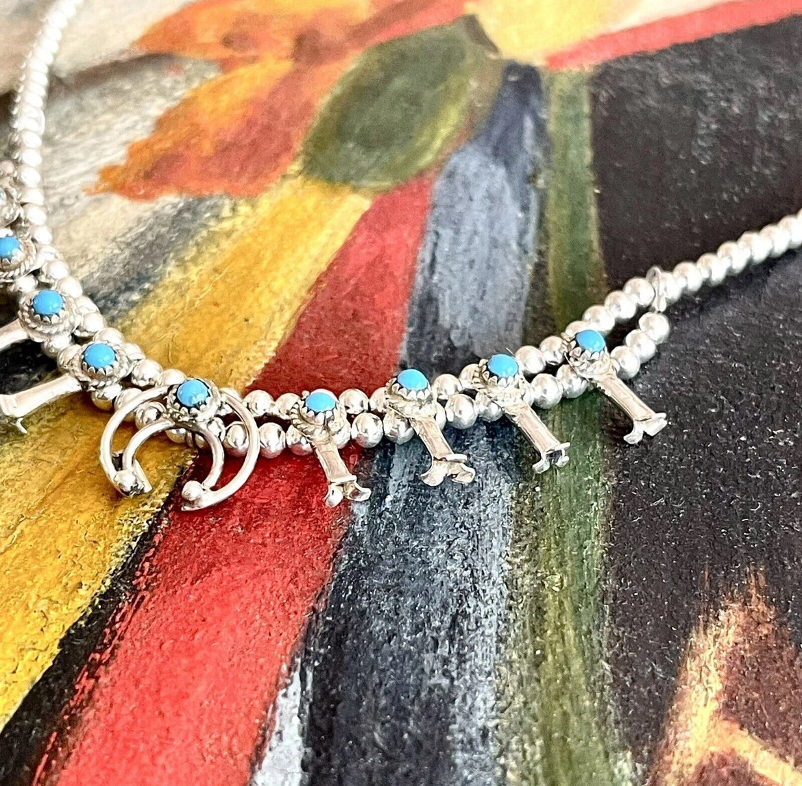 Mini Navajo Sleeping Beauty Turquoise Squash Blossom Necklace
by Navajo artist Larry Curley