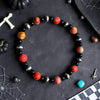 6" Black Onyx & Orange Sea Sediment Jasper Stretch Bracelet