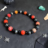 6" Black Onyx & Orange Sea Sediment Jasper Stretch Bracelet