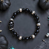 Black Onyx Hand-Carved Skully Stretch Bracelet — 6"