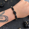 Black Onyx Hand-Carved Skully Stretch Bracelet — 6"